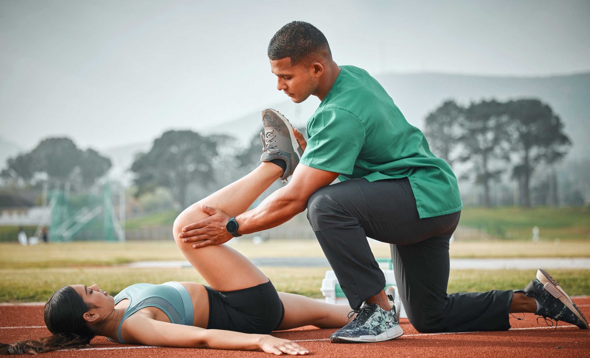 One-on-one care with physical therapist and patient on track